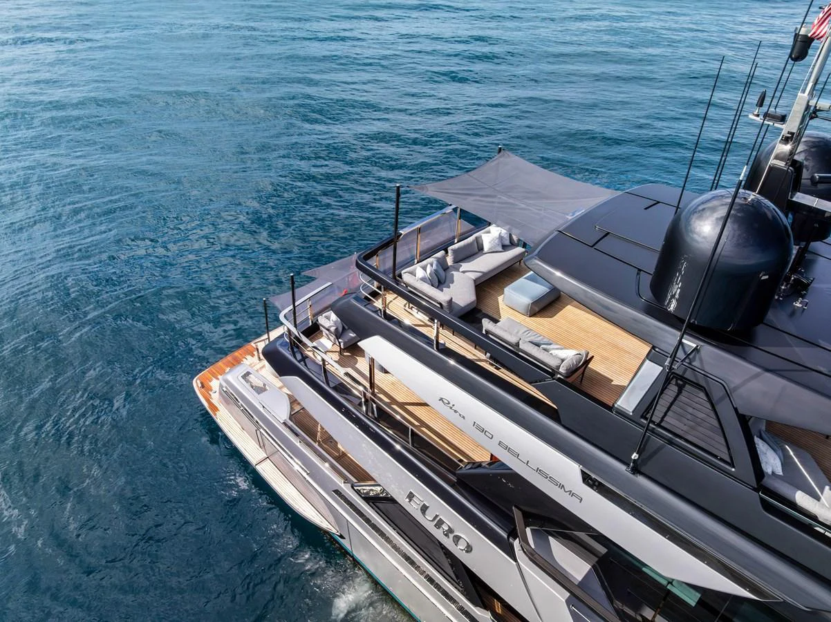 The yacht's aft deck features luxurious lounging areas with a sleek, modern design. aboard EURO Yacht for Sale