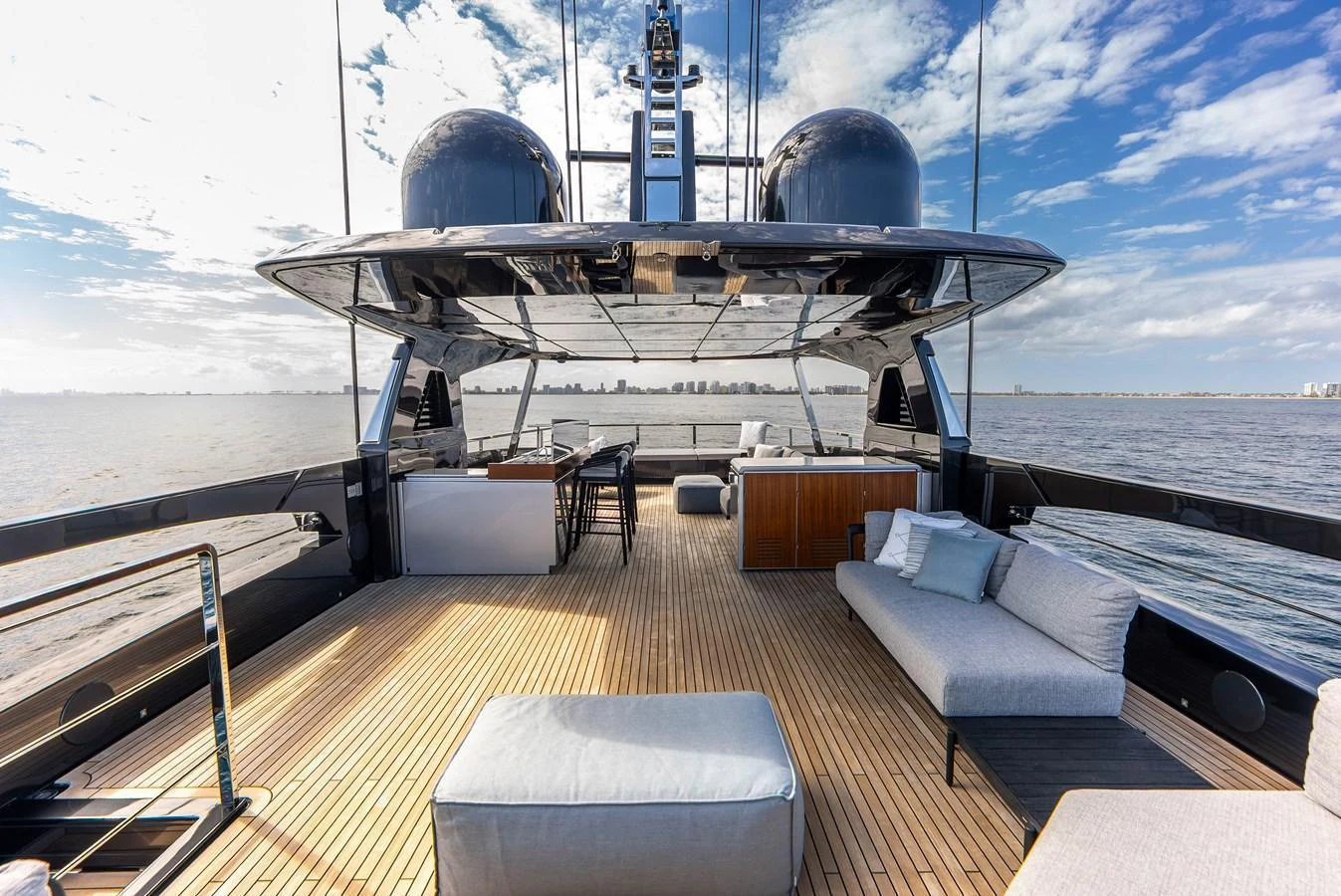 The spacious aft deck offers luxurious seating and stunning views of the water. aboard EURO Yacht for Sale