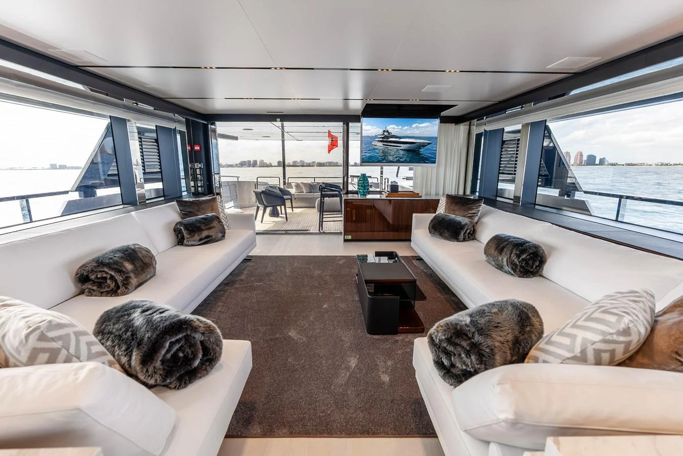 The salon offers a spacious and luxurious seating area with panoramic views and modern amenities. aboard EURO Yacht for Sale