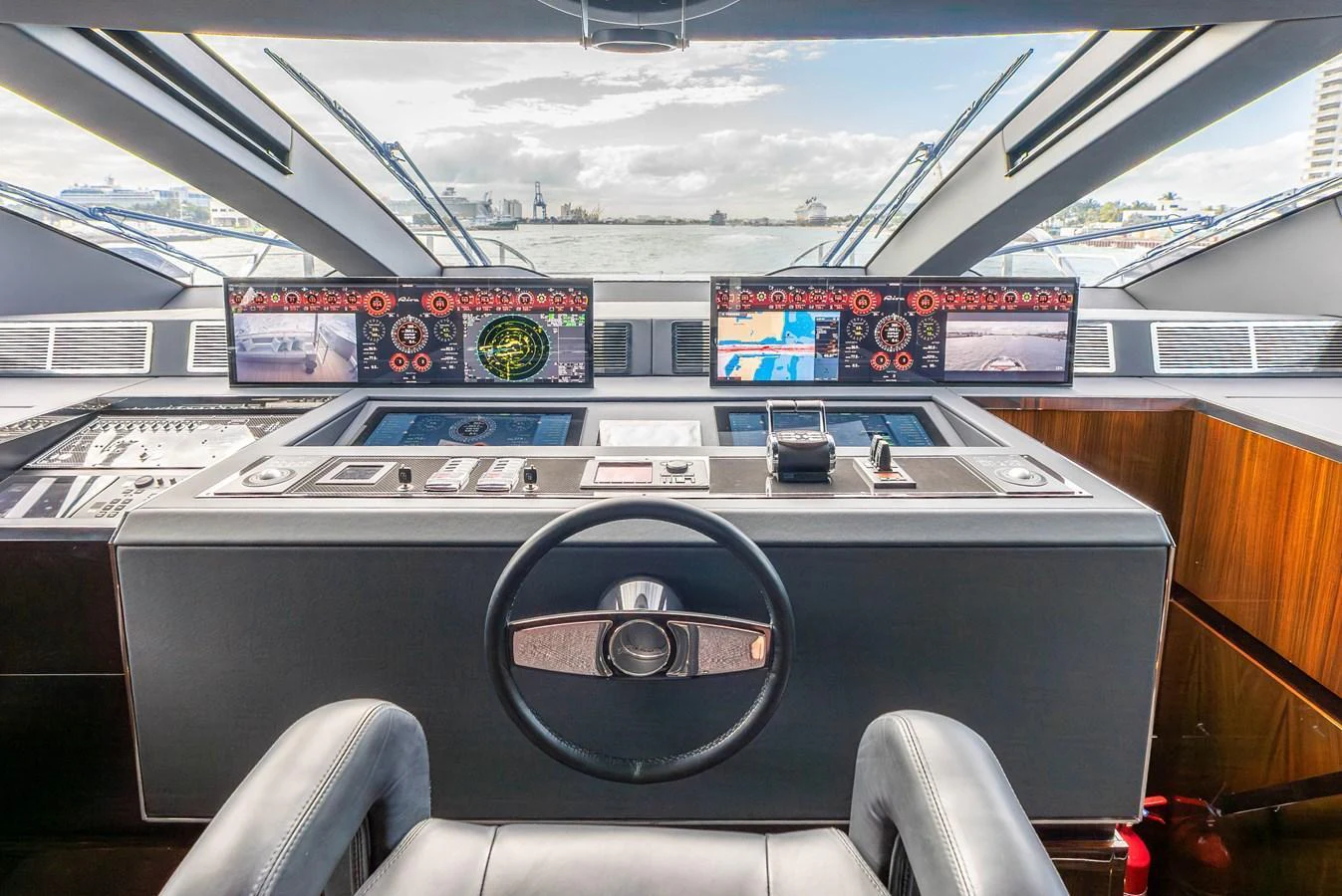The helm station features advanced navigation equipment and a panoramic view. aboard EURO Yacht for Sale