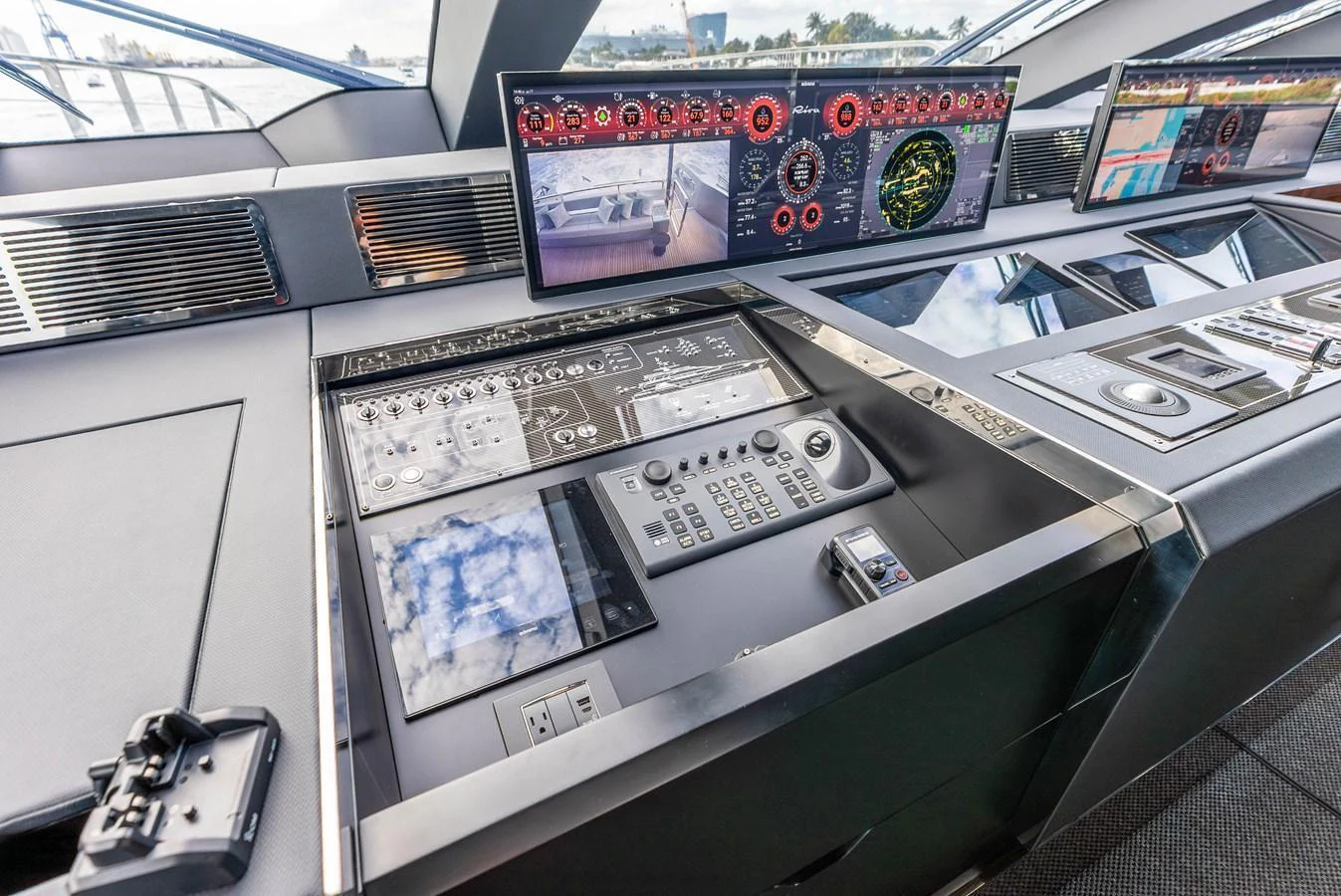 The helm station features advanced navigation and control systems with multiple screens and modern instrumentation. aboard EURO Yacht for Sale