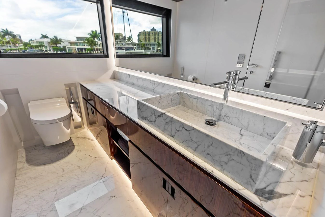 The yacht's bathroom features luxurious marble countertops and modern fixtures. aboard EURO Yacht for Sale