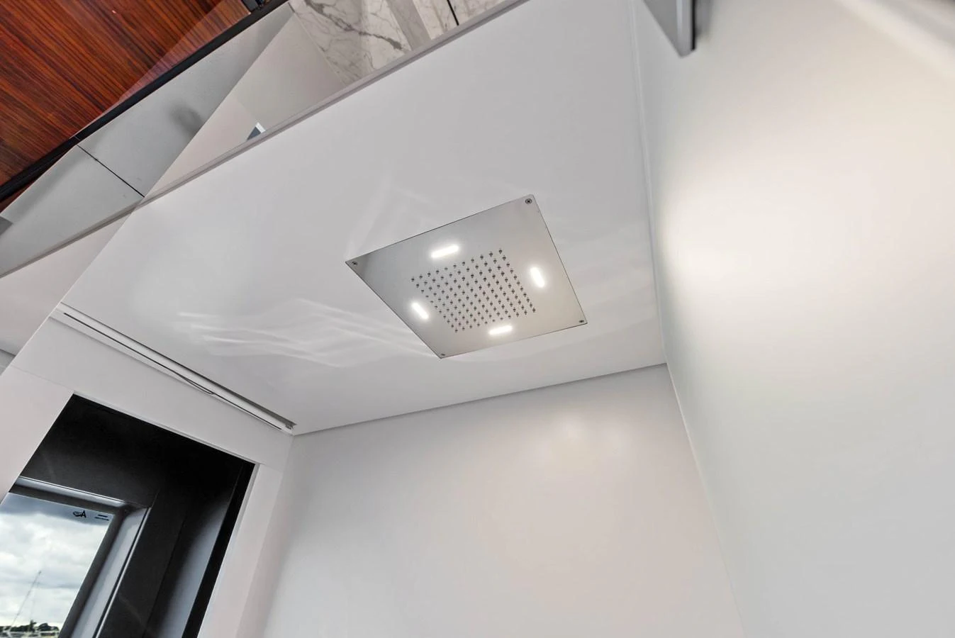 A close-up view of a modern ceiling with integrated lighting and ventilation. aboard EURO Yacht for Sale