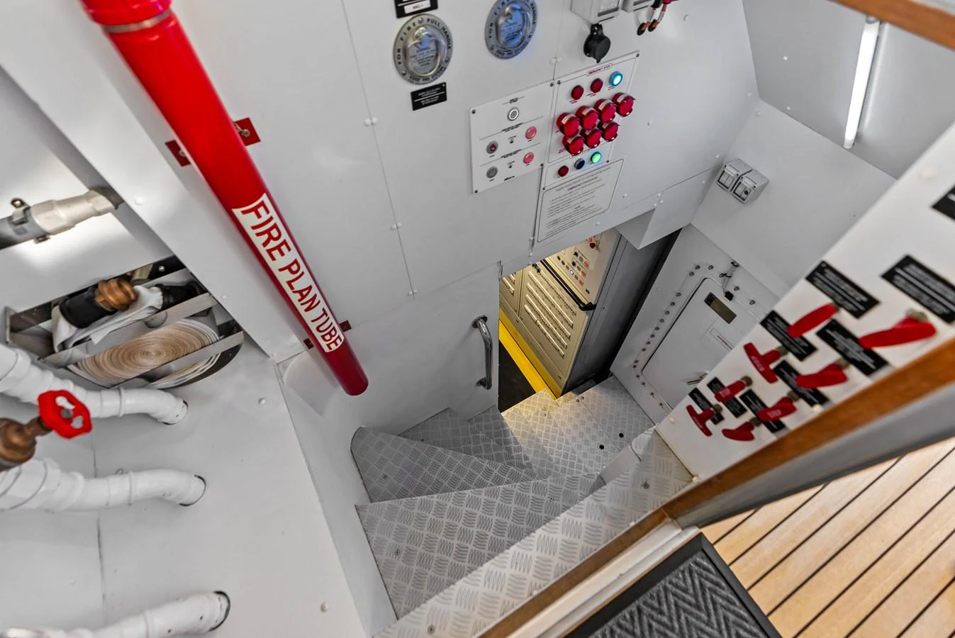 This image showcases the stairway leading to the yacht's engine room, emphasizing safety features and access points. aboard EURO Yacht for Sale