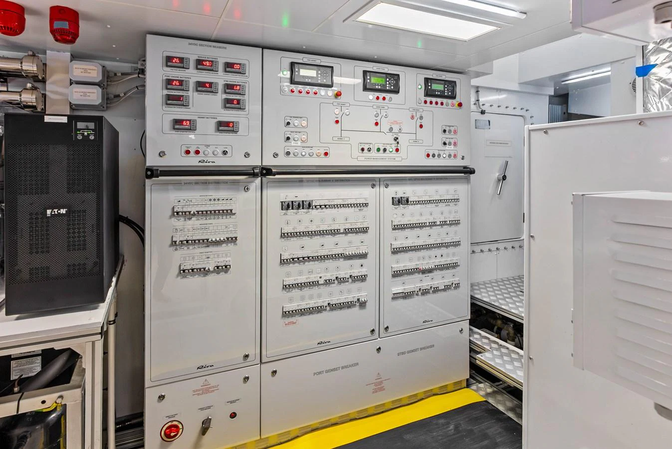 The engine room features a well-organized control panel with advanced monitoring systems. aboard EURO Yacht for Sale