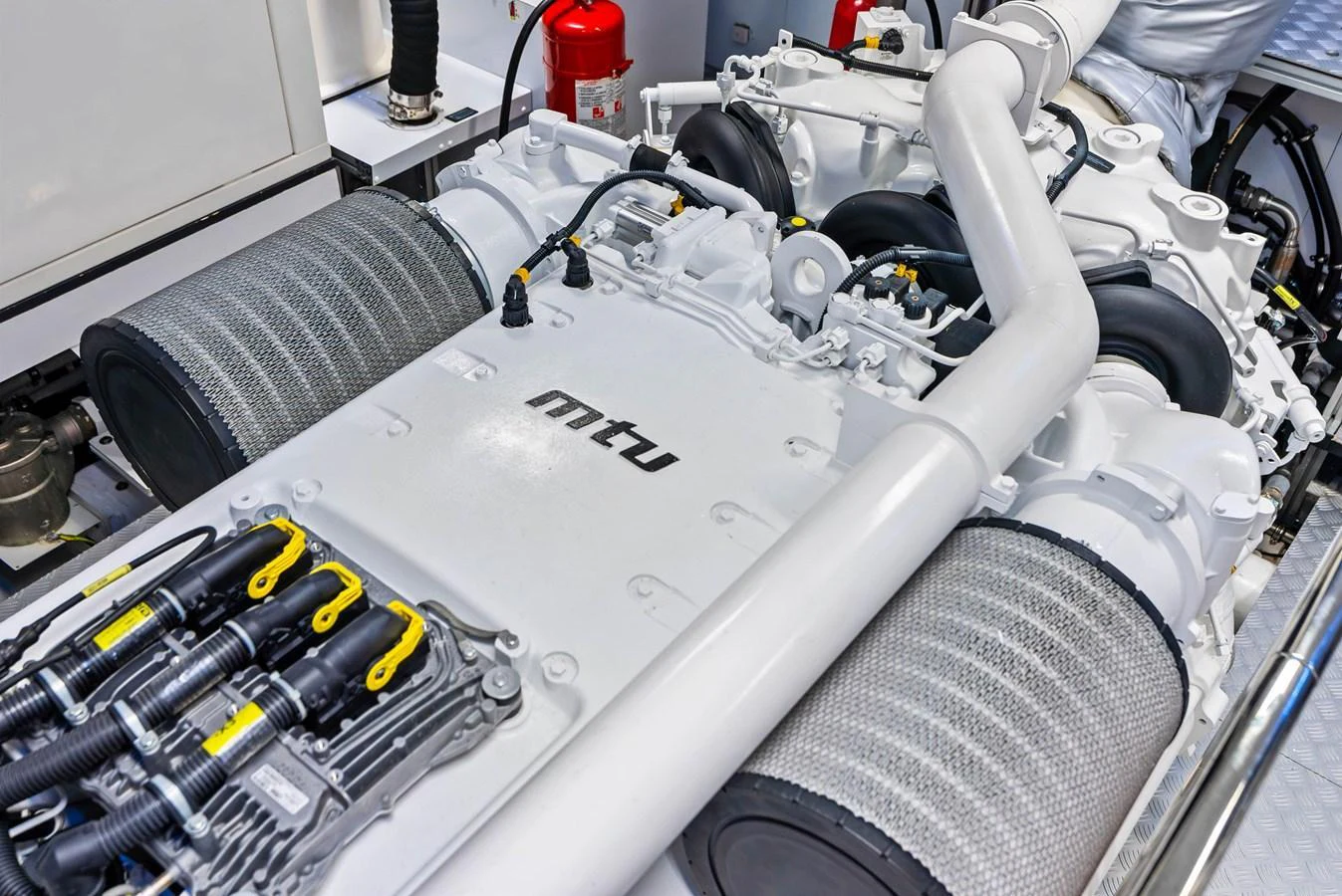 A pristine engine room showcasing powerful MTU engines. aboard EURO Yacht for Sale