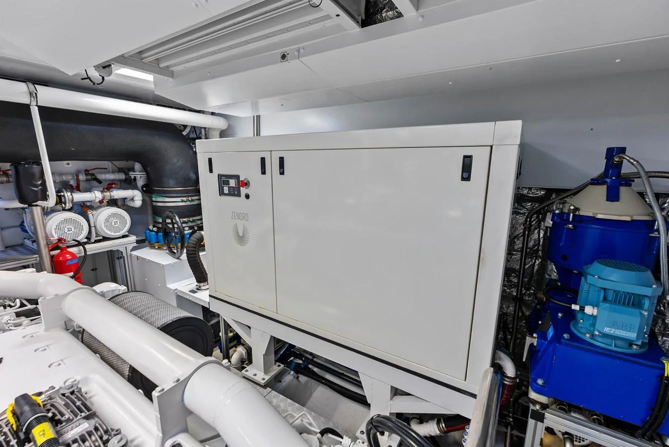 The image showcases the well-organized and clean engine room of the yacht. aboard EURO Yacht for Sale