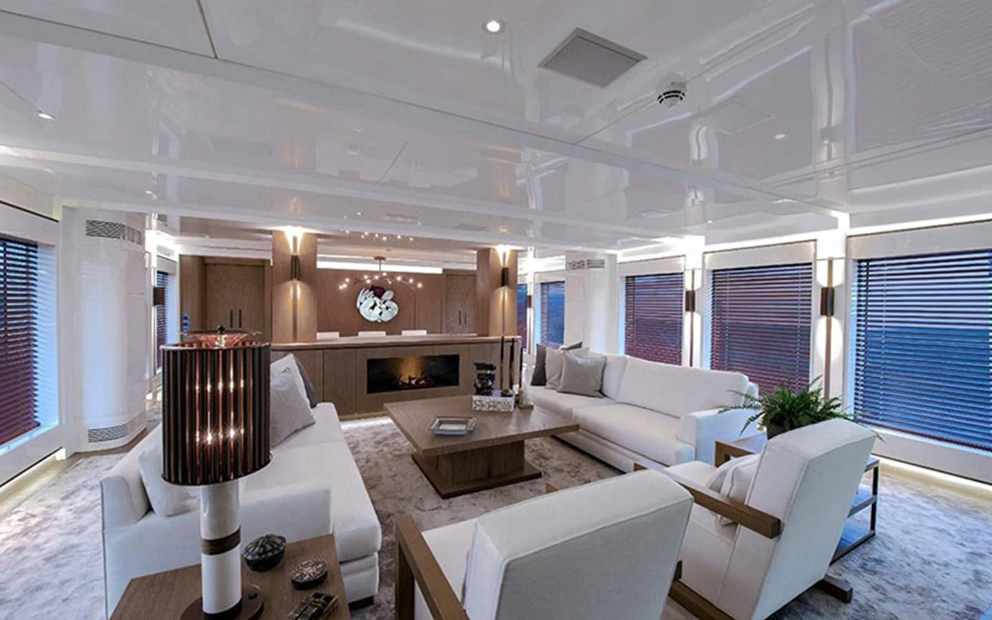 The salon features luxurious seating with modern decor and ample natural light. aboard CMB  108 Yacht for Sale