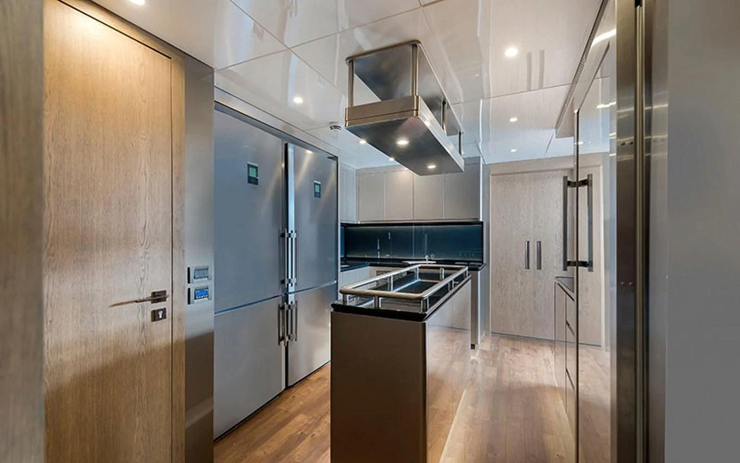 The modern galley features sleek stainless steel appliances and ample storage space. aboard CMB  108 Yacht for Sale