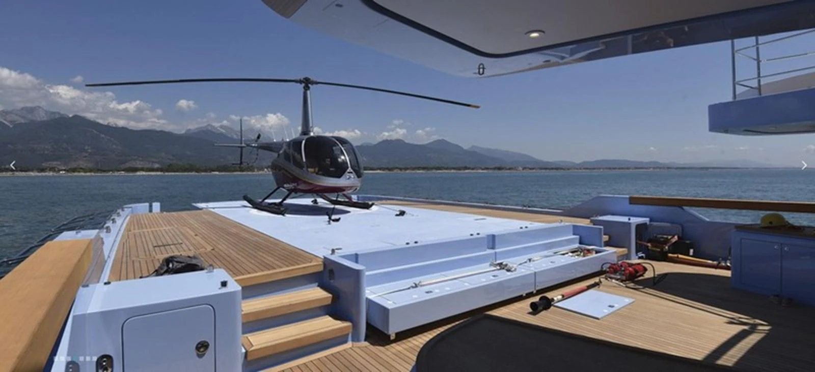 The yacht features a spacious helipad on the aft deck, offering convenient access for helicopter arrivals. aboard OCEAN DREAMWALKER III Yacht for Sale