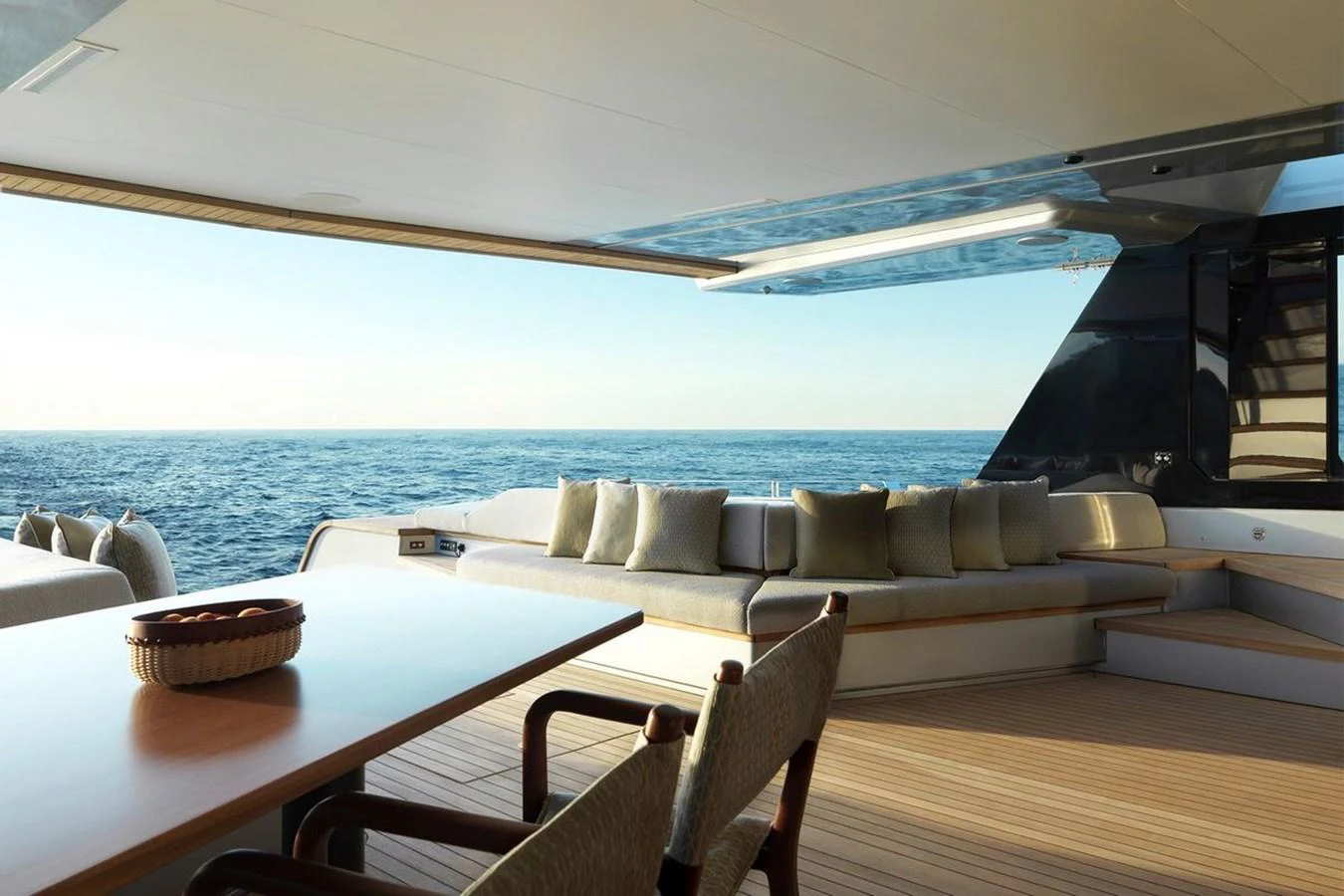 The aft deck offers a spacious and comfortable lounging area with a stunning ocean view. aboard CARAT Yacht for Sale