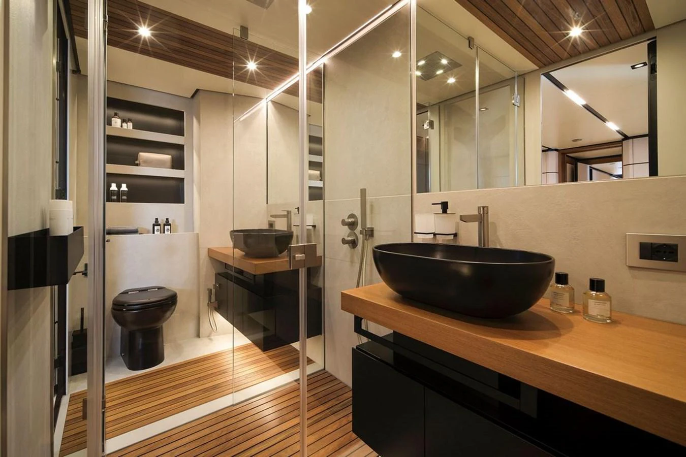 A luxurious yacht bathroom featuring modern fixtures and elegant design. aboard CARAT Yacht for Sale