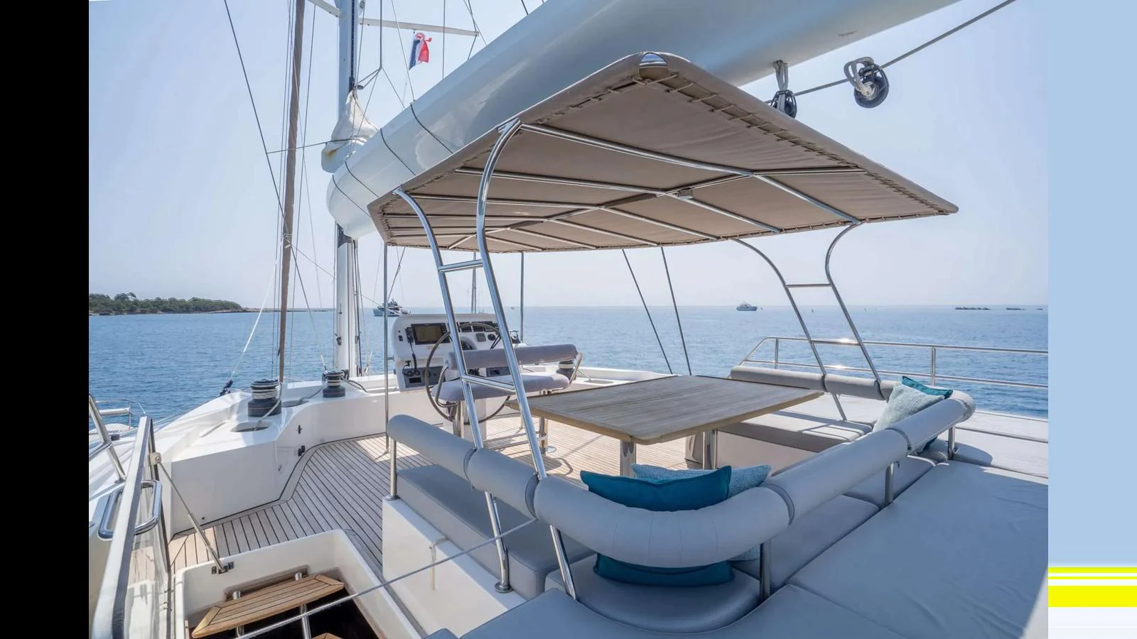 The flybridge offers a spacious and shaded lounging area with panoramic sea views. aboard SEAZEN II Yacht for Sale