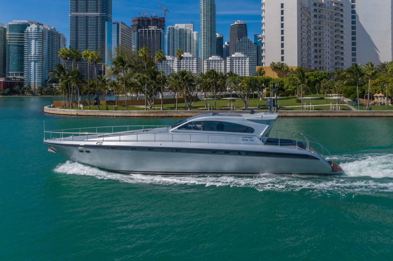 a white boat in the water aboard HAPPY ONE Yacht for Sale