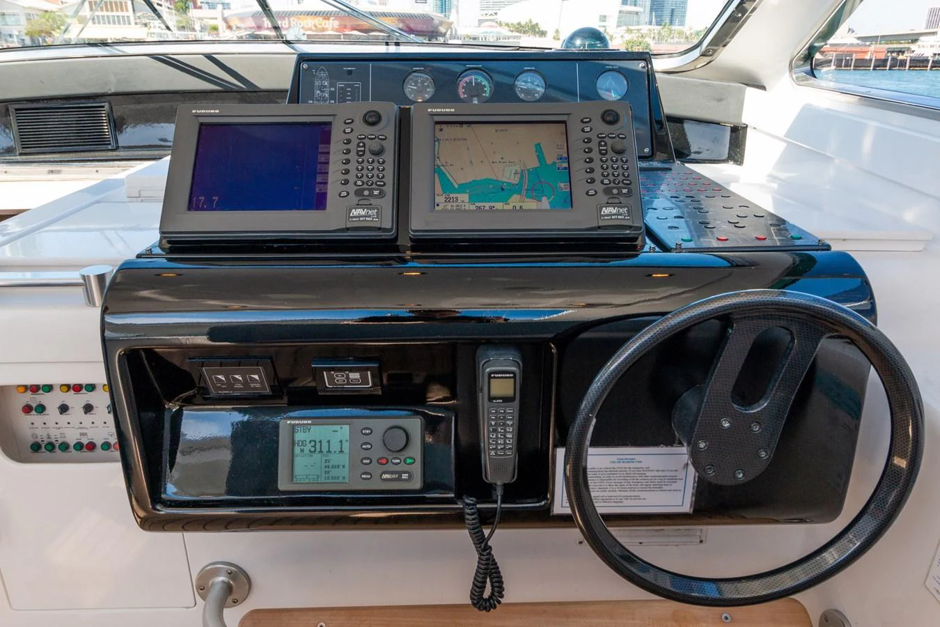a car with a screen and buttons aboard HAPPY ONE Yacht for Sale