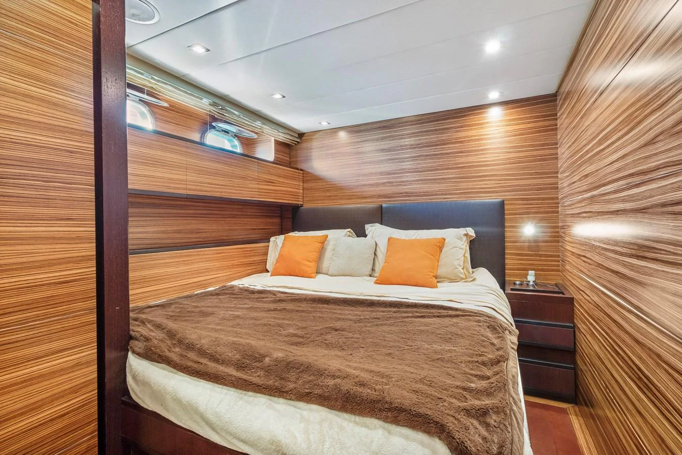 a bed in a room aboard HAPPY ONE Yacht for Sale