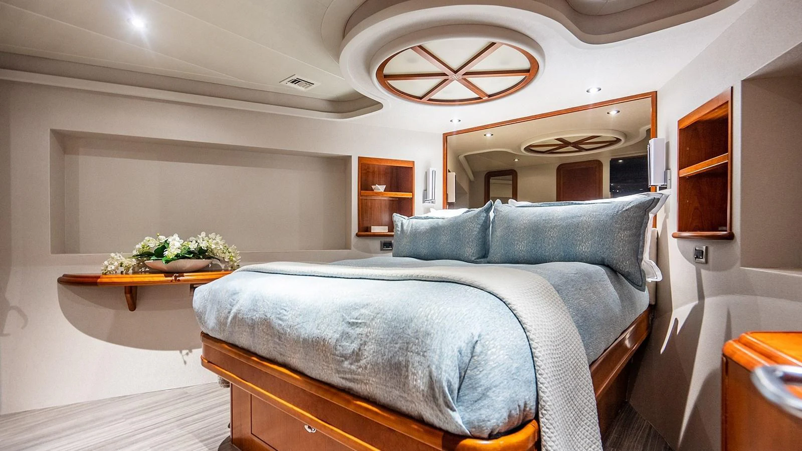 The master stateroom features a plush bed with elegant bedding and tasteful decor. aboard KEMOSABE Yacht for Sale