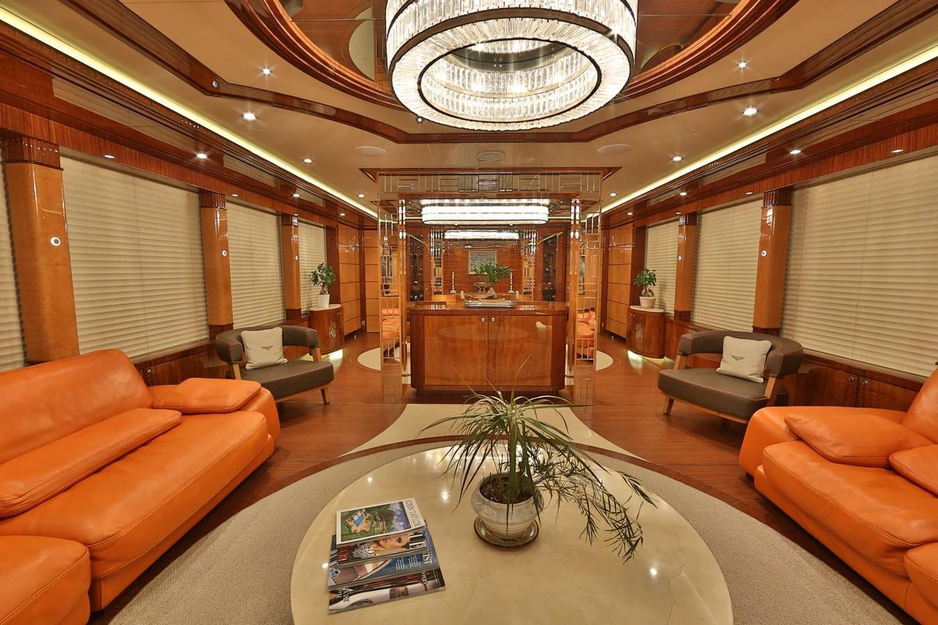 The luxurious interior features elegant seating and a sophisticated ambiance. aboard ELADA Yacht for Sale