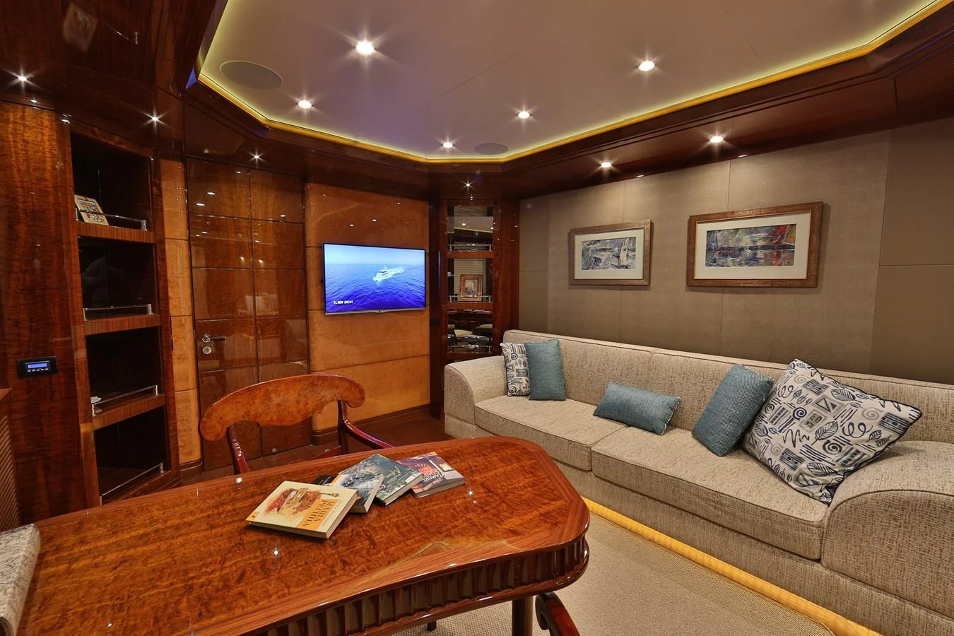 The yacht's salon offers a cozy and elegant space with plush seating and a sophisticated ambiance. aboard ELADA Yacht for Sale