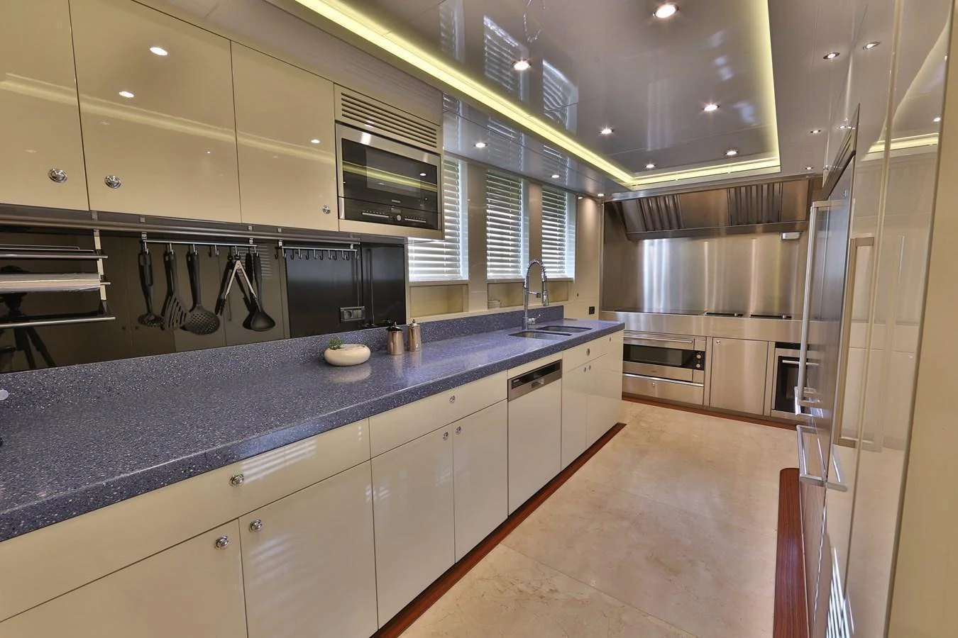 The galley features modern appliances and ample counter space for gourmet meal preparation. aboard ELADA Yacht for Sale
