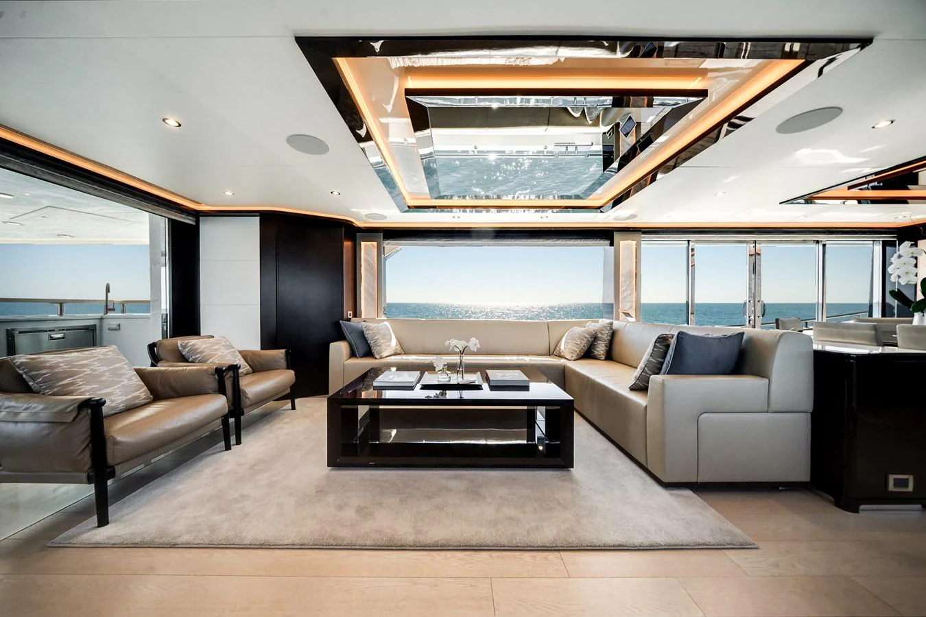 The yacht's salon features luxurious seating with panoramic ocean views. aboard OCEAN ALEXANDER 37L/01 Yacht for Sale