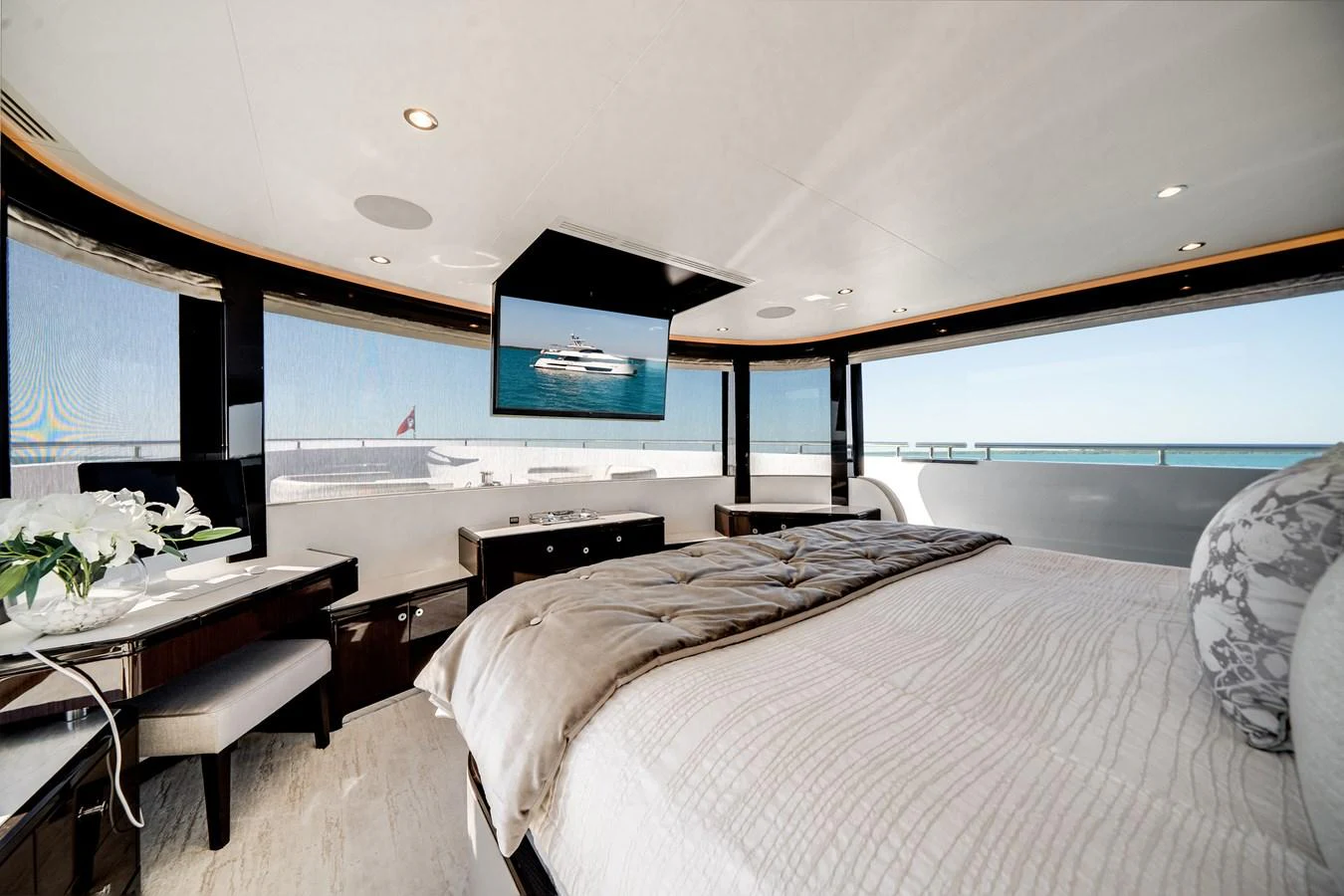 A luxurious stateroom with panoramic windows offering stunning ocean views. aboard OCEAN ALEXANDER 37L/01 Yacht for Sale