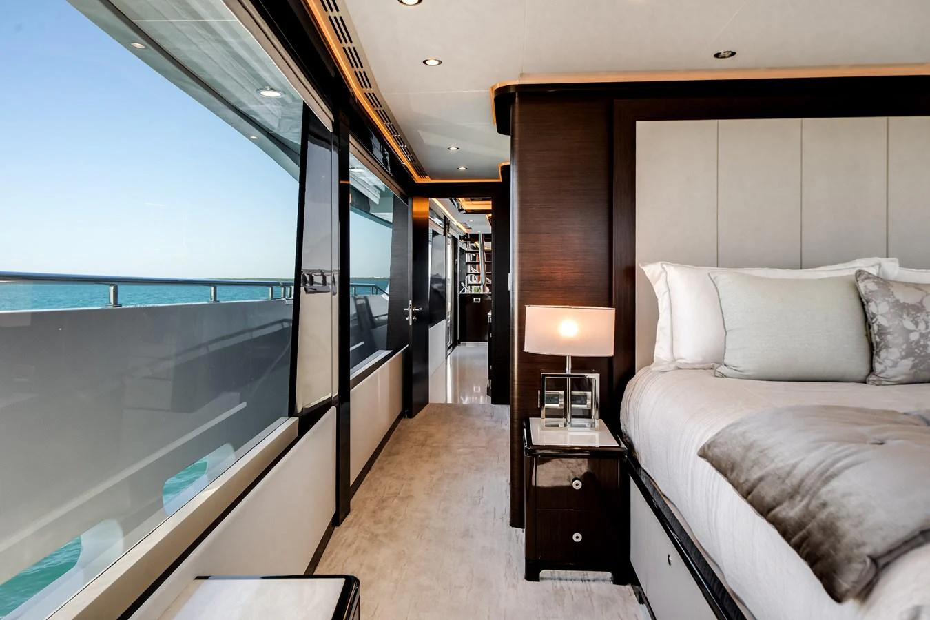 The luxurious stateroom features large windows offering stunning ocean views and elegant furnishings. aboard OCEAN ALEXANDER 37L/01 Yacht for Sale