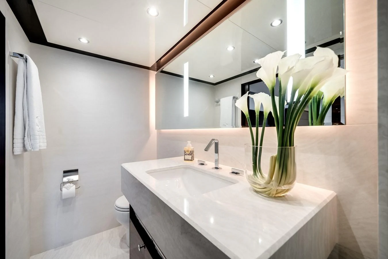 A luxurious yacht bathroom with modern fixtures and elegant lighting. aboard OCEAN ALEXANDER 37L/01 Yacht for Sale