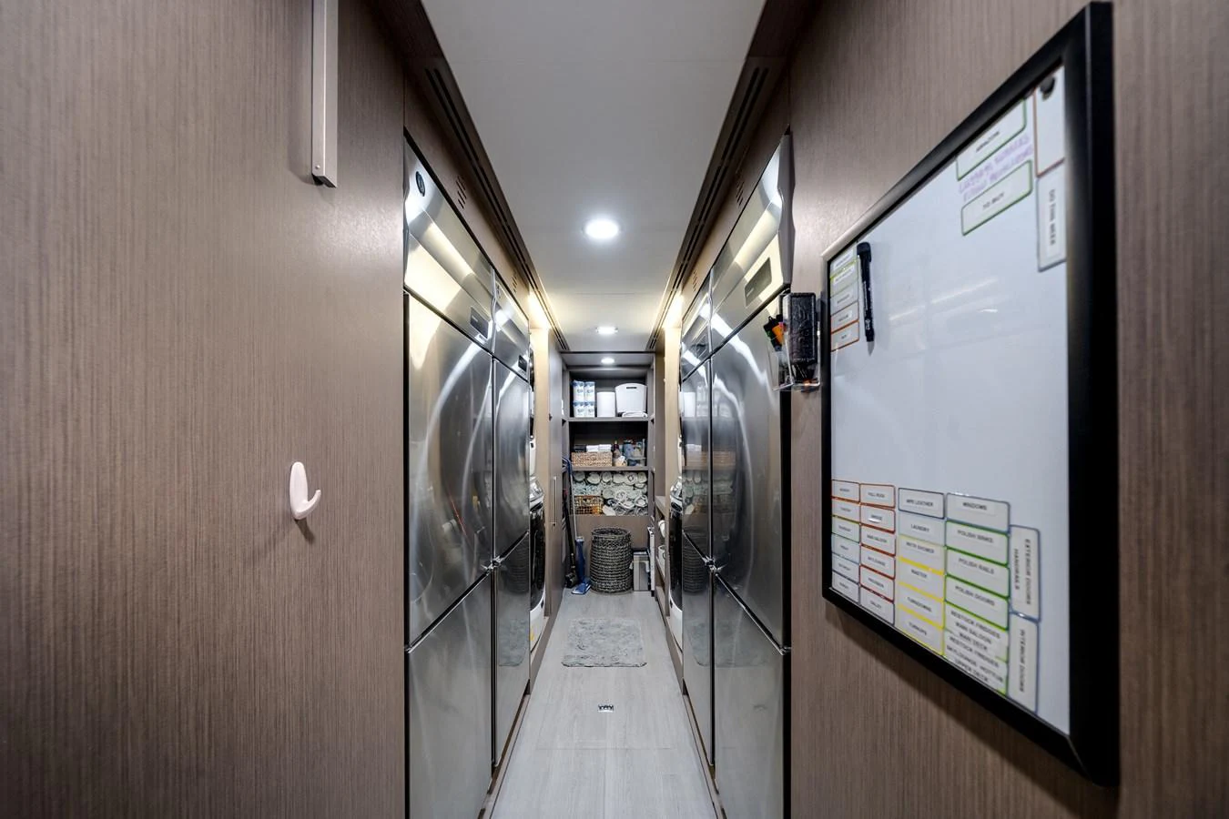 The yacht's laundry room is equipped with modern appliances and ample storage space. aboard OCEAN ALEXANDER 37L/01 Yacht for Sale