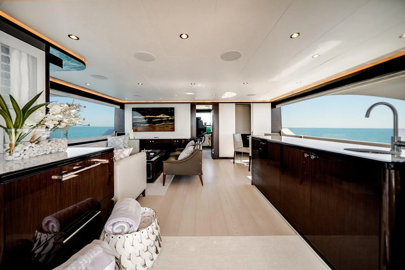 The salon offers a spacious and elegant area with panoramic ocean views. aboard OCEAN ALEXANDER 37L/01 Yacht for Sale
