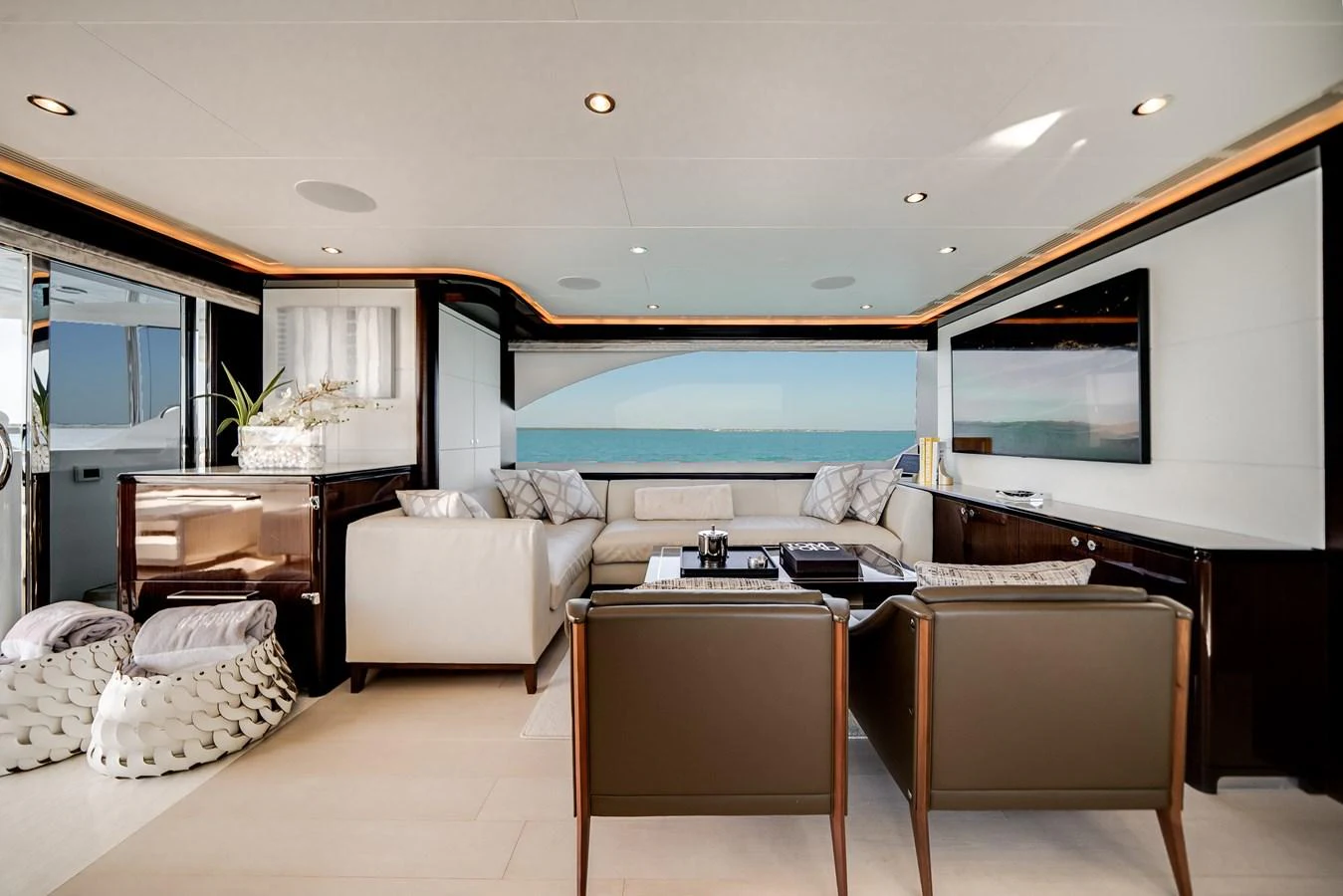 The yacht's salon offers a luxurious and spacious seating area with panoramic ocean views. aboard OCEAN ALEXANDER 37L/01 Yacht for Sale