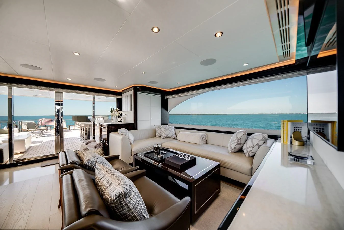 The salon offers a luxurious and spacious seating area with panoramic ocean views. aboard OCEAN ALEXANDER 37L/01 Yacht for Sale