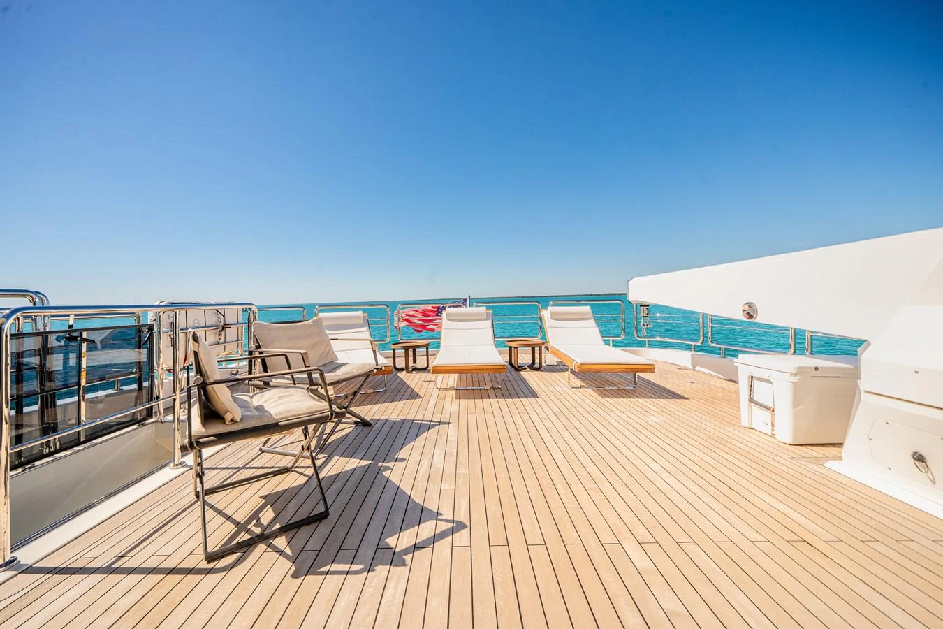 The sundeck offers a spacious area with lounge chairs and stunning ocean views. aboard OCEAN ALEXANDER 37L/01 Yacht for Sale