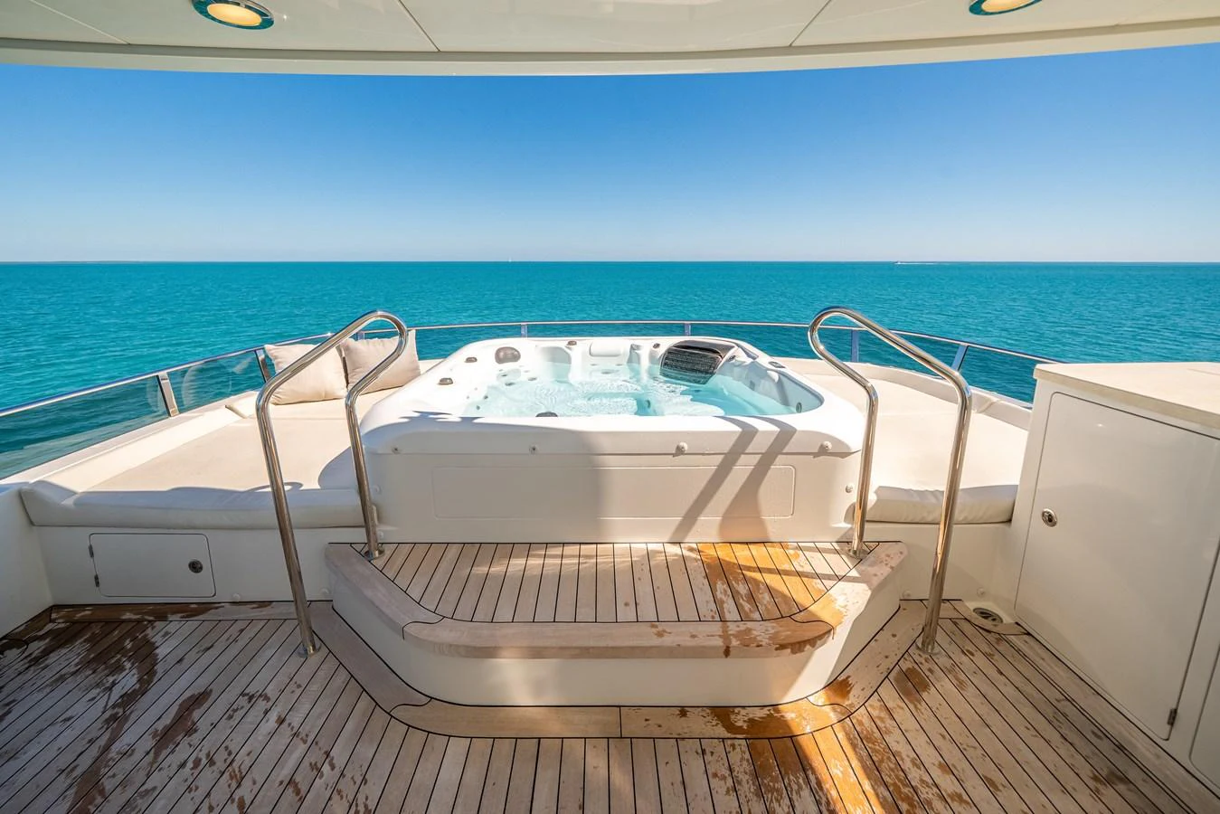 The yacht features a luxurious jacuzzi on the deck, offering stunning ocean views. aboard OCEAN ALEXANDER 37L/01 Yacht for Sale