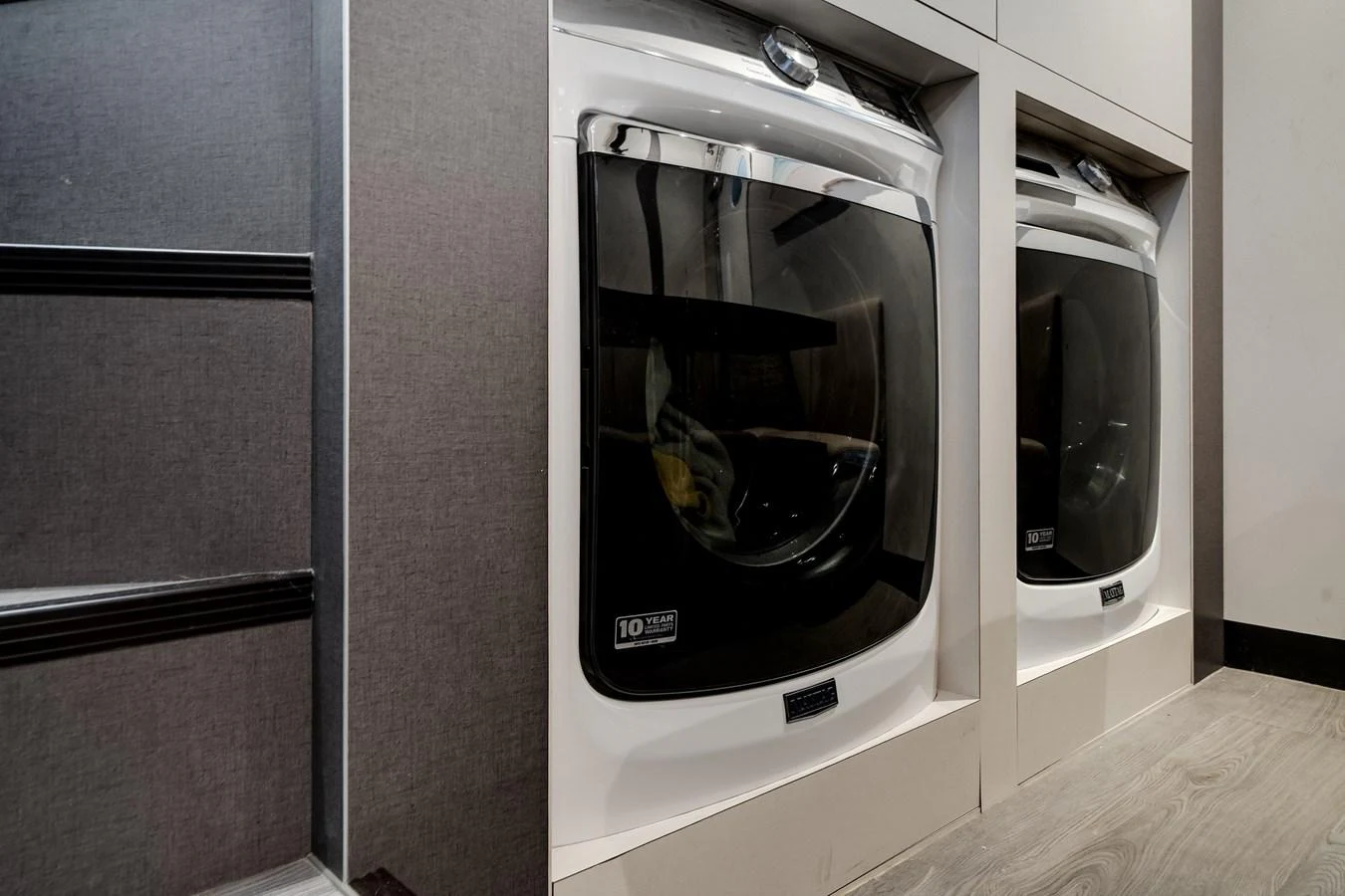 The yacht features a modern laundry area with state-of-the-art appliances. aboard OCEAN ALEXANDER 37L/01 Yacht for Sale