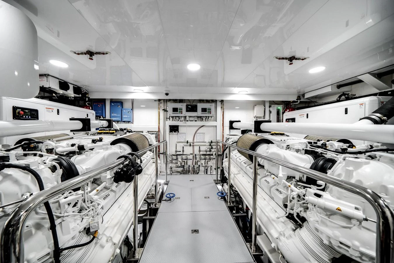 The image showcases a pristine and well-organized engine room with advanced machinery and equipment. aboard OCEAN ALEXANDER 37L/01 Yacht for Sale