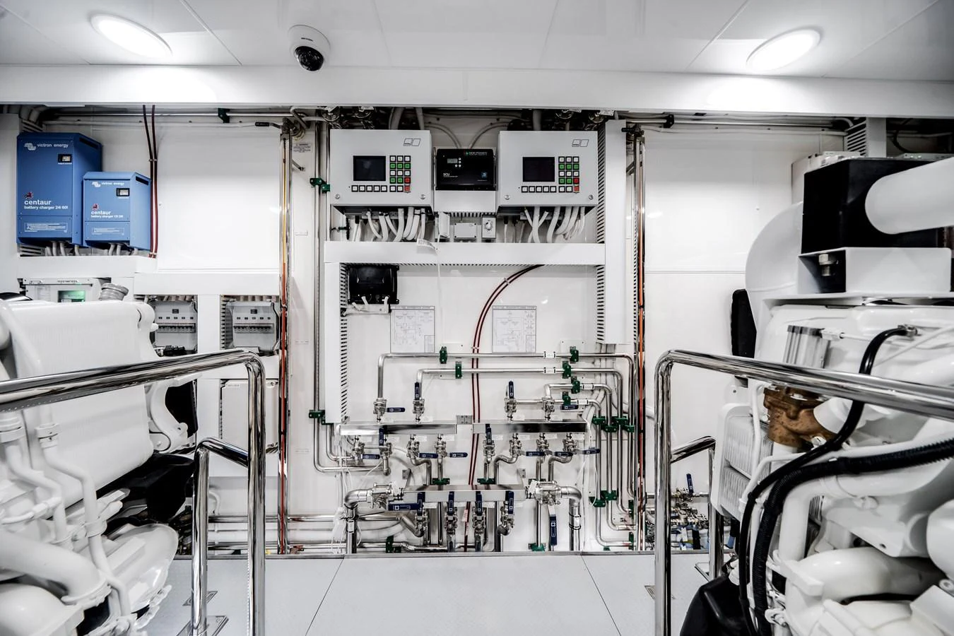 The yacht's engine room showcases its advanced mechanical systems and meticulous organization. aboard OCEAN ALEXANDER 37L/01 Yacht for Sale