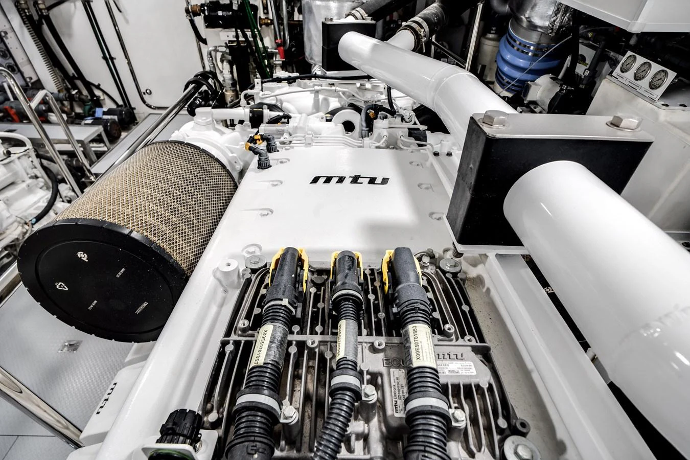 The image showcases the intricate details of the yacht's engine room, highlighting the advanced engineering and machinery. aboard OCEAN ALEXANDER 37L/01 Yacht for Sale