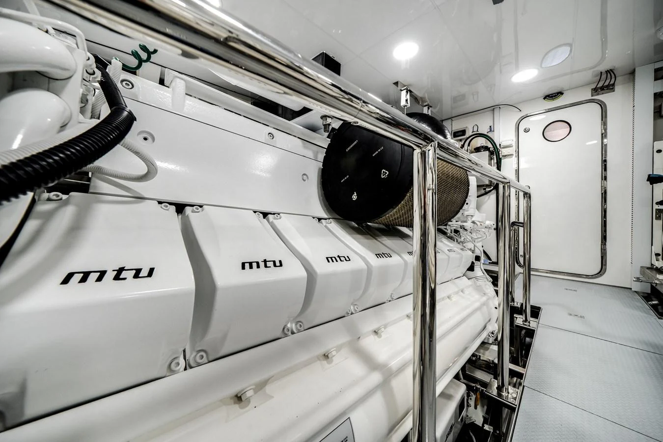 The engine room showcases powerful MTU engines, meticulously maintained for peak performance. aboard OCEAN ALEXANDER 37L/01 Yacht for Sale