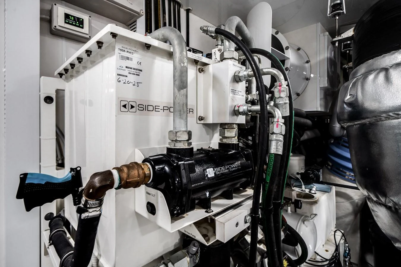A close-up view of the yacht's engine room showcasing technical equipment and machinery. aboard OCEAN ALEXANDER 37L/01 Yacht for Sale
