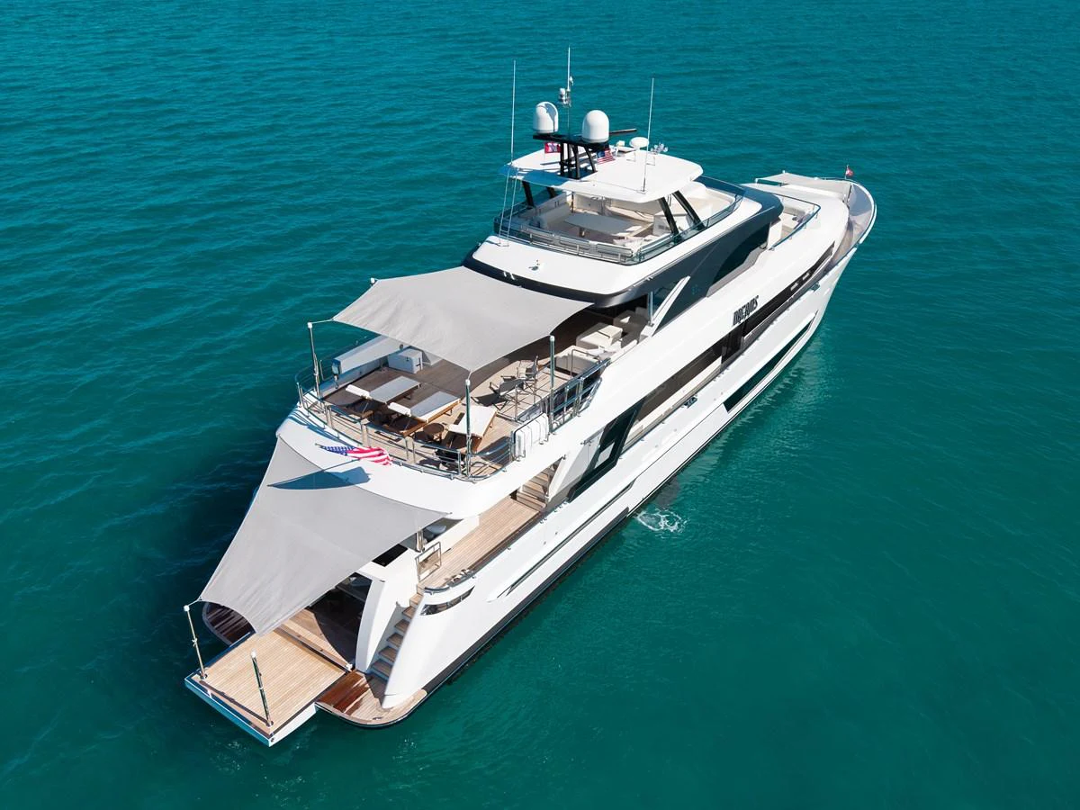 A sleek and modern yacht cruising on clear blue waters, showcasing its spacious decks and elegant design. aboard OCEAN ALEXANDER 37L/01 Yacht for Sale