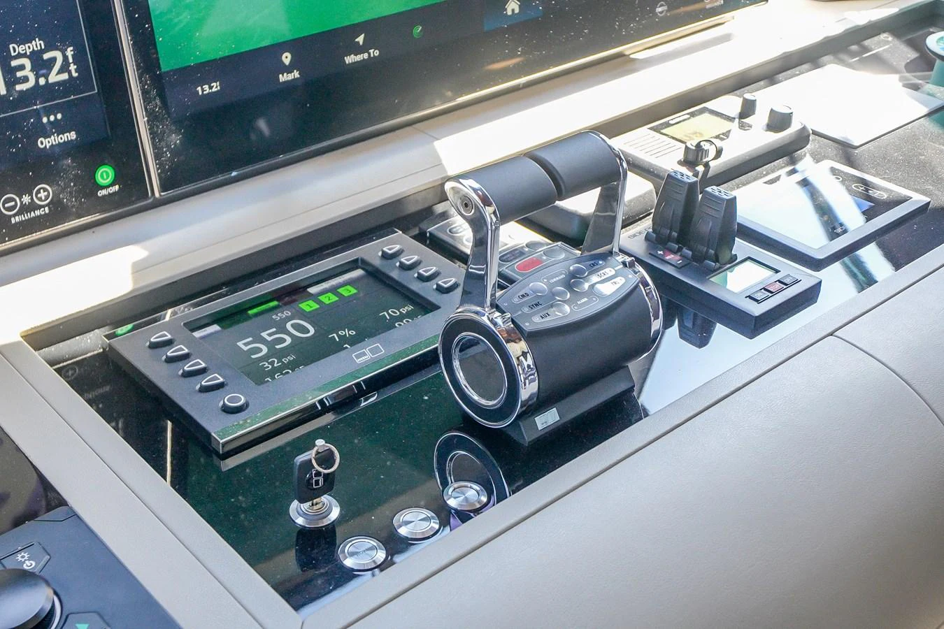 The helm station features advanced navigation and control equipment for precise maneuvering. aboard OCEAN ALEXANDER 37L/01 Yacht for Sale