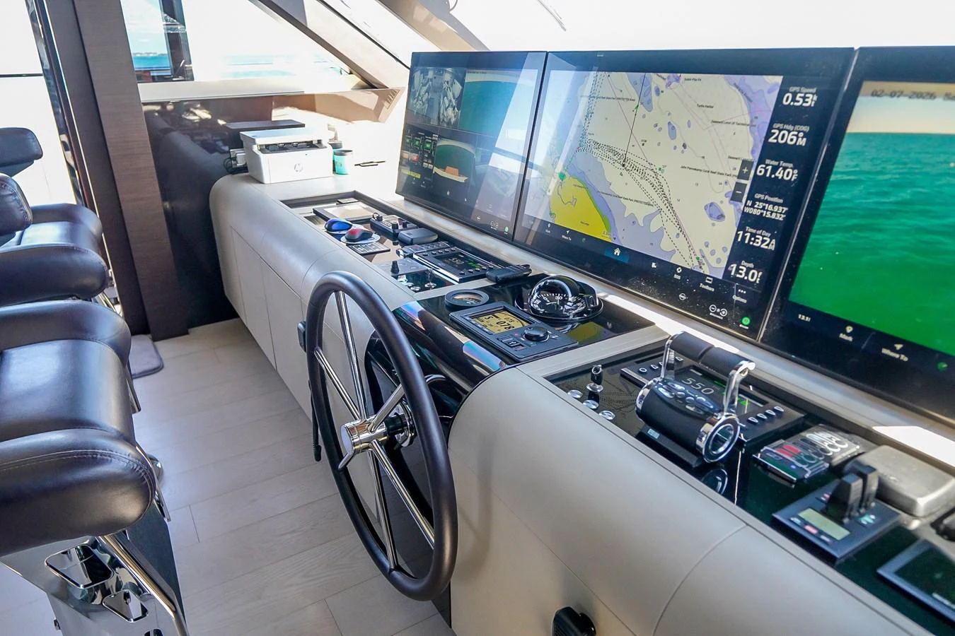 The helm station features advanced navigation equipment and a sleek, modern design. aboard OCEAN ALEXANDER 37L/01 Yacht for Sale