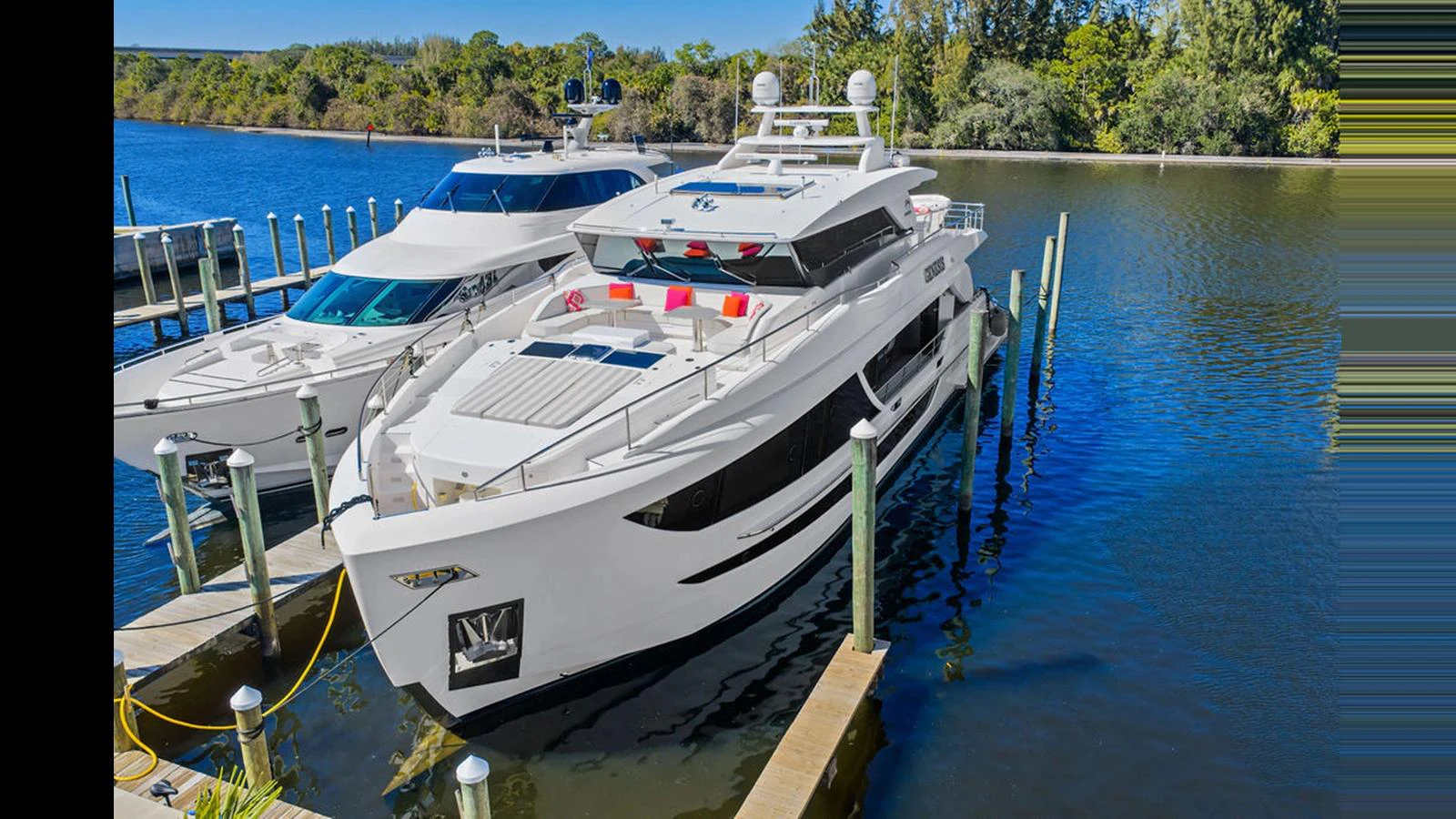 a group of boats are parked in a harbor aboard MOBILLITY Yacht for Sale
