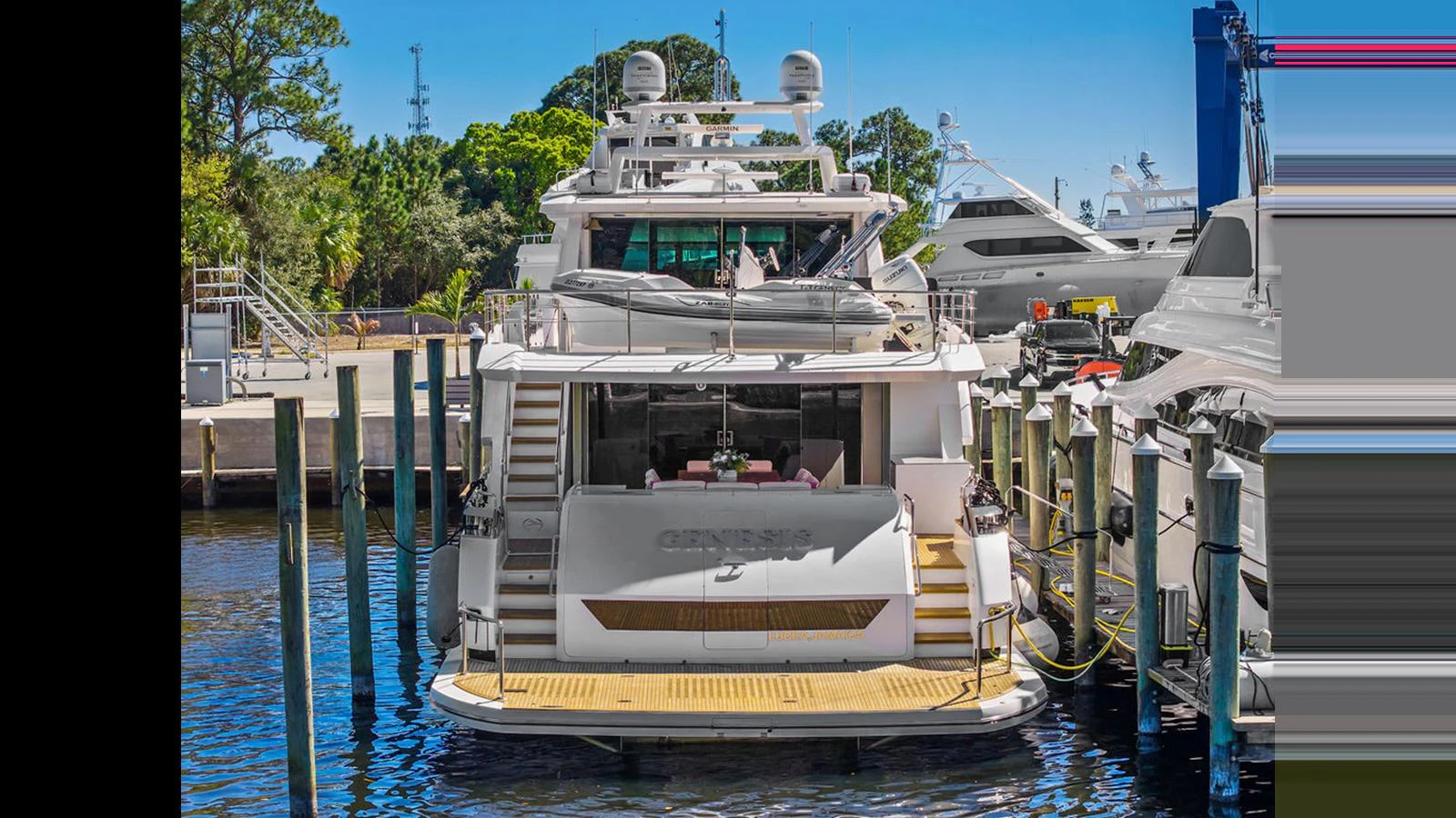 a boat docked at a pier aboard MOBILLITY Yacht for Sale