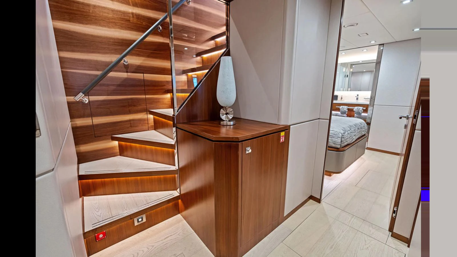 a wooden staircase in a room aboard MOBILLITY Yacht for Sale
