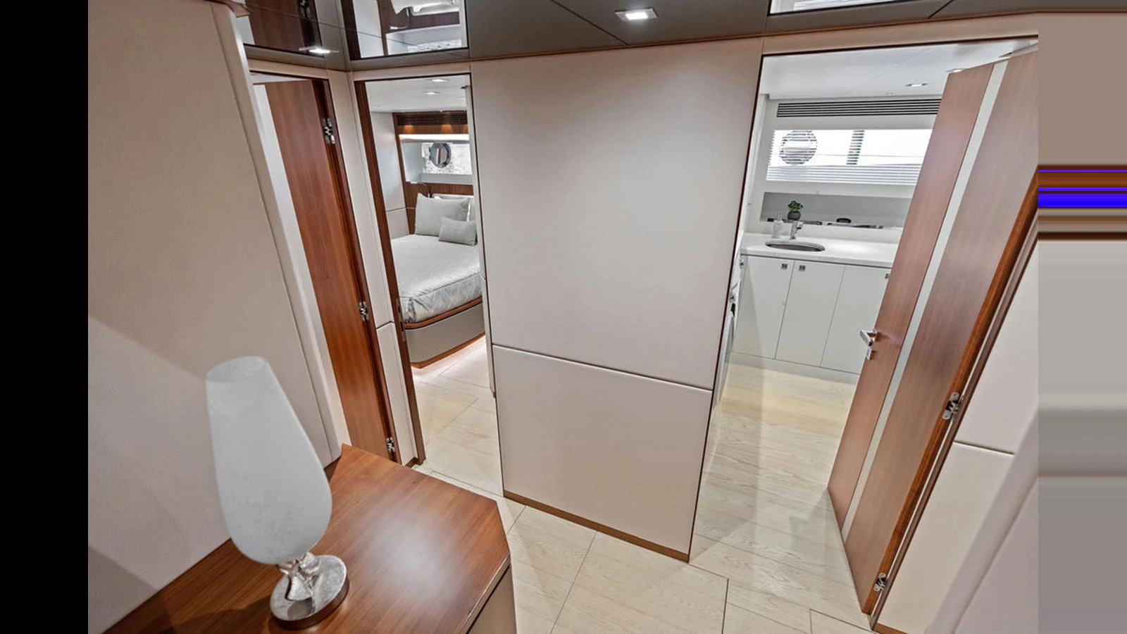 a room with a chair and a bed aboard MOBILLITY Yacht for Sale