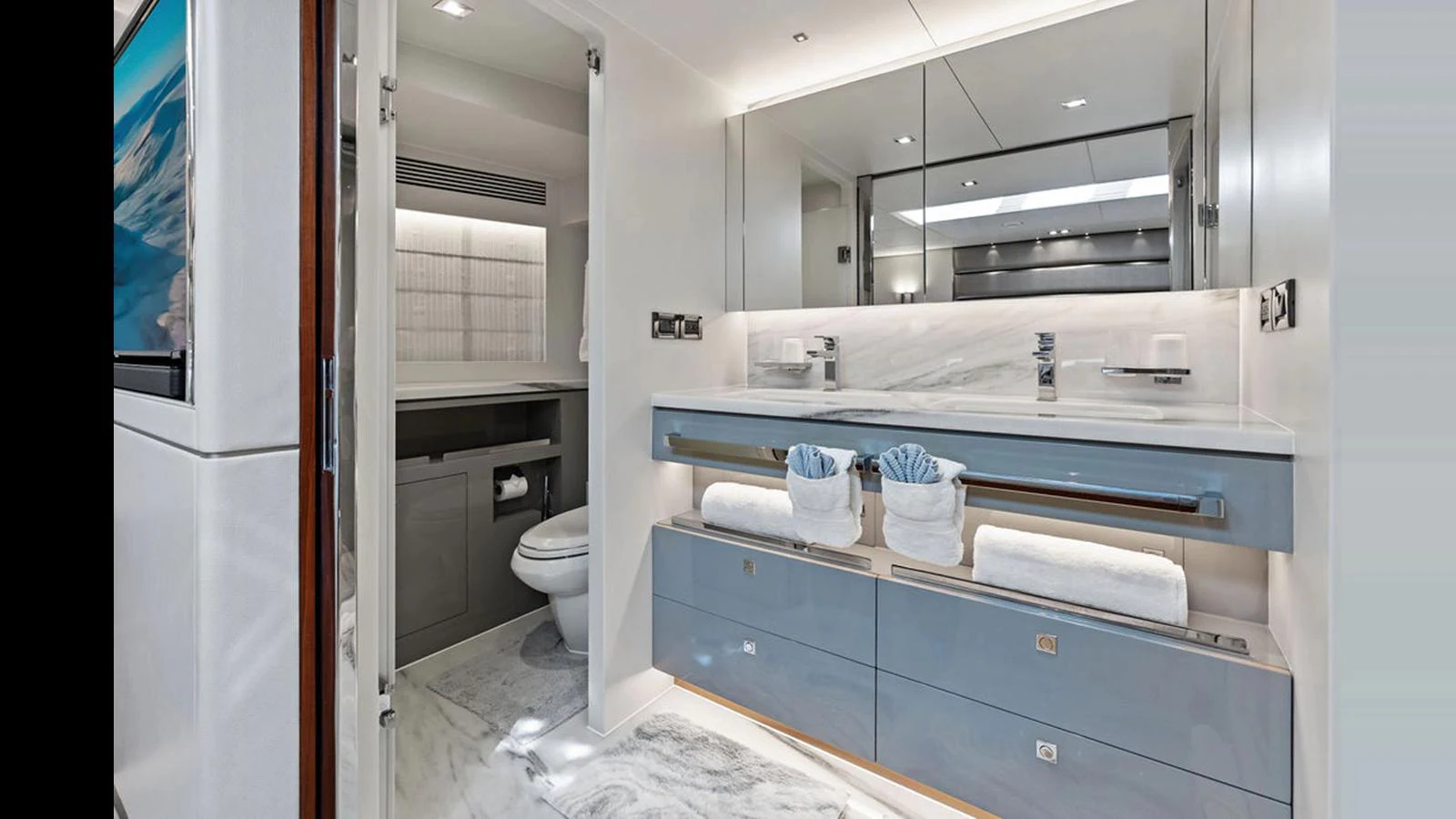 a bathroom with a sink and a toilet aboard MOBILLITY Yacht for Sale