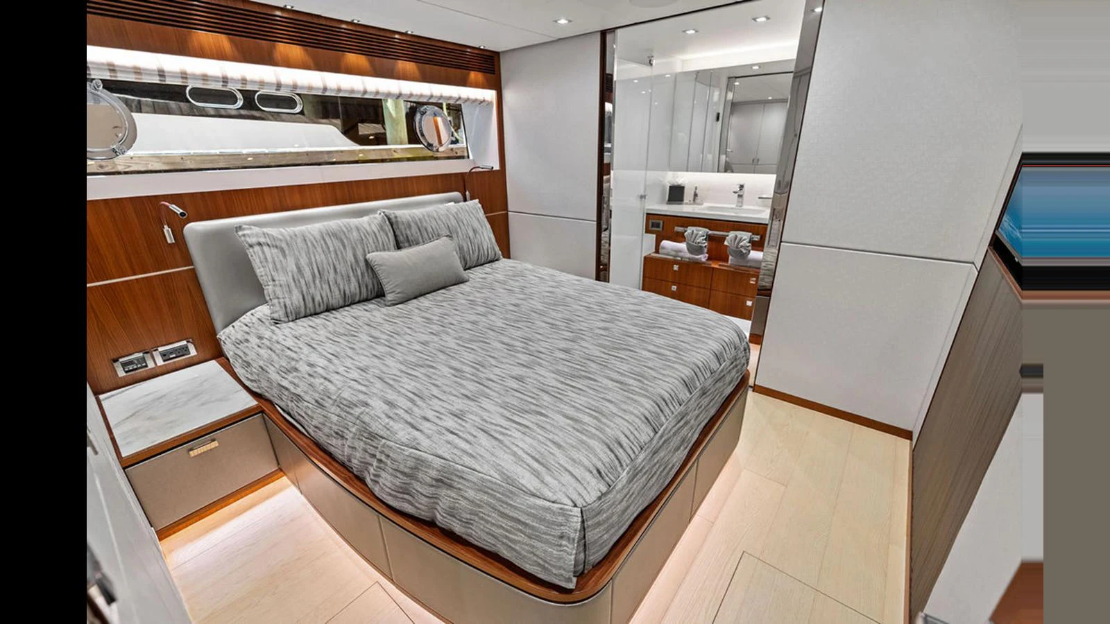 a bedroom with a bed aboard MOBILLITY Yacht for Sale