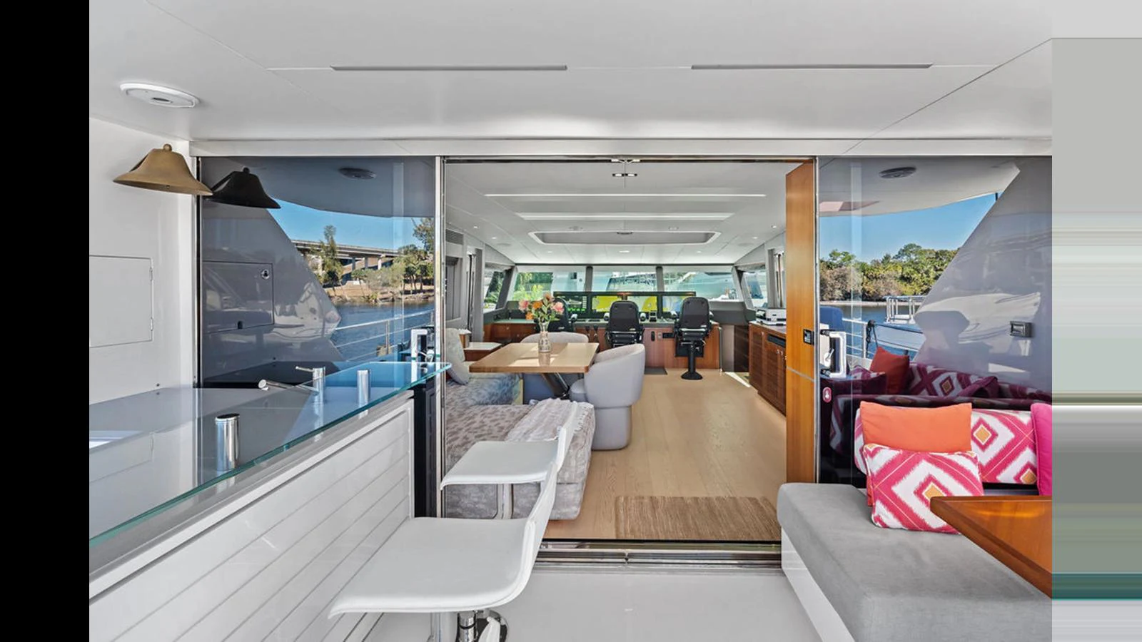 inside of a building with a large window and a view of the ocean aboard MOBILLITY Yacht for Sale